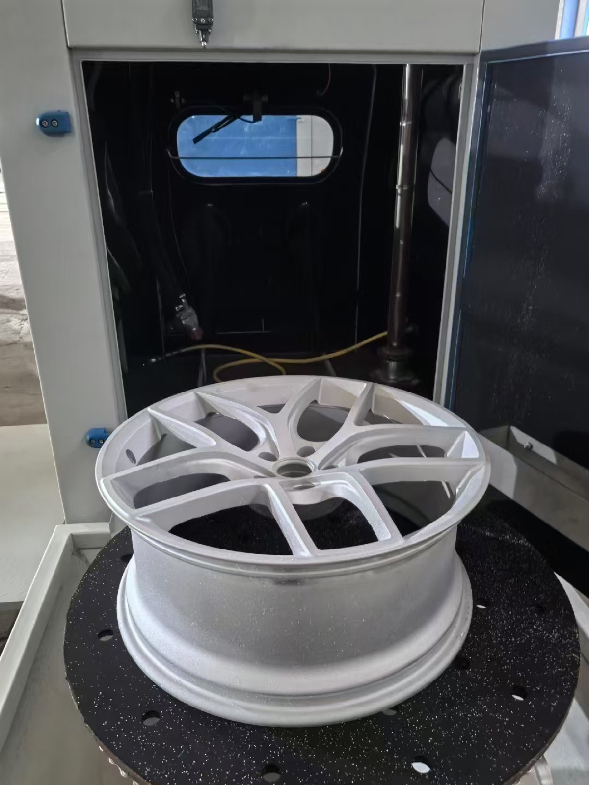 Alloy wheel surface blasting
